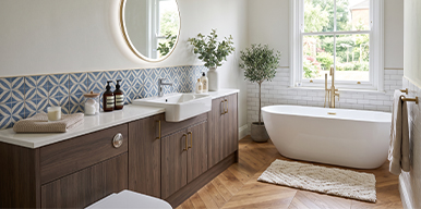Paramount bathroom interior with a freestanding bath and fitted furniture